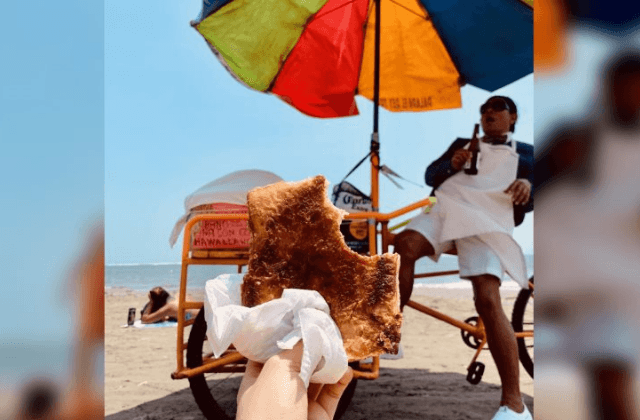 ¡Héroe sin capa! Ambulante 'truequea' volovanes por chelas en la playa